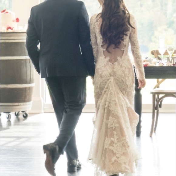 Petite long sleeve plunging v-neckline ivory lace wedding gown